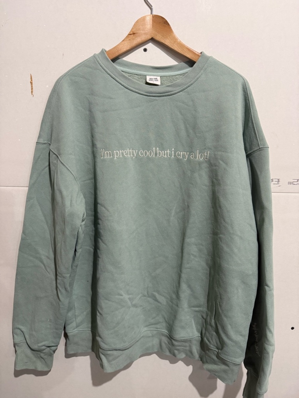 Relaxed Sage Green Crewneck Sweatshirt with Subtle Script